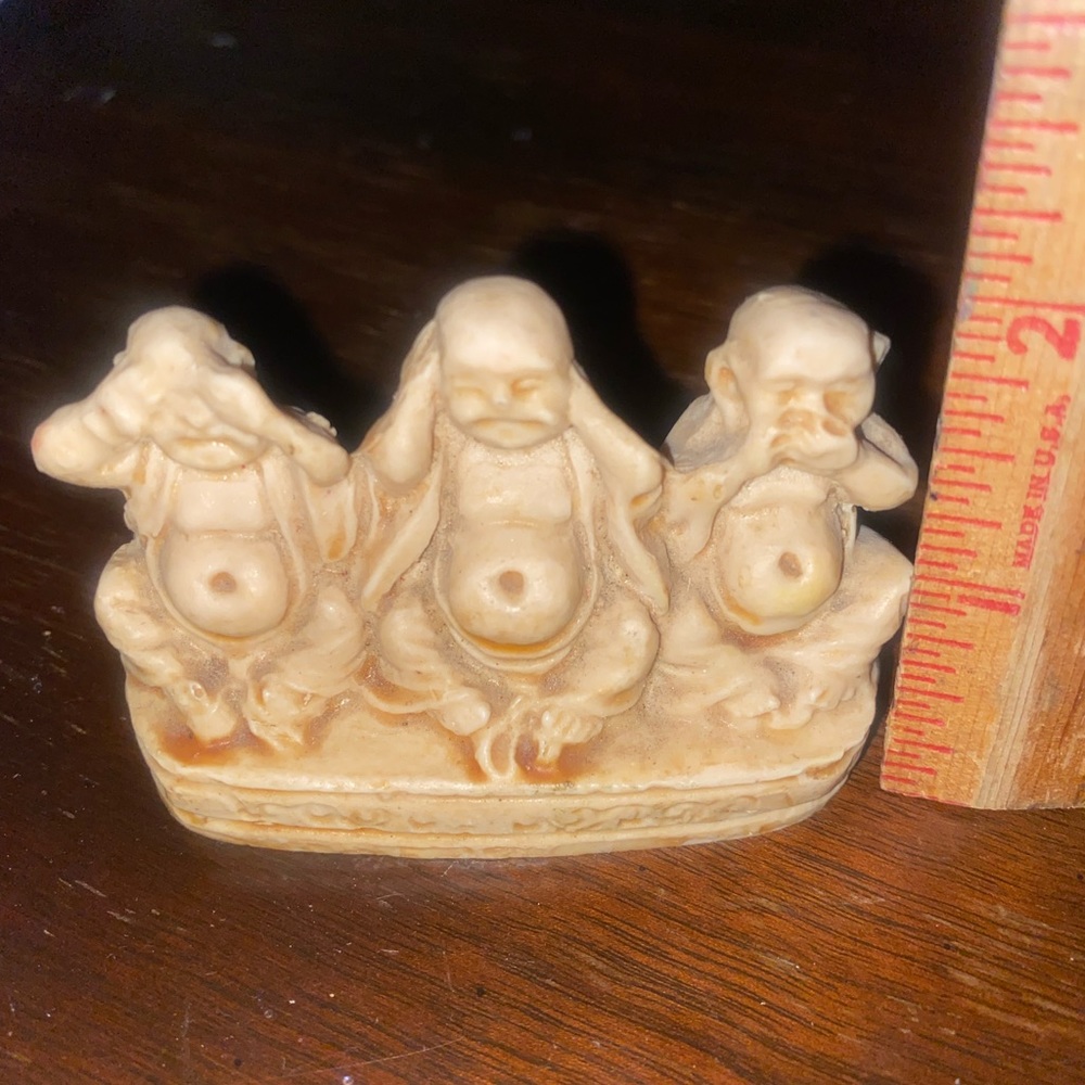 Old carved bone budda figurine